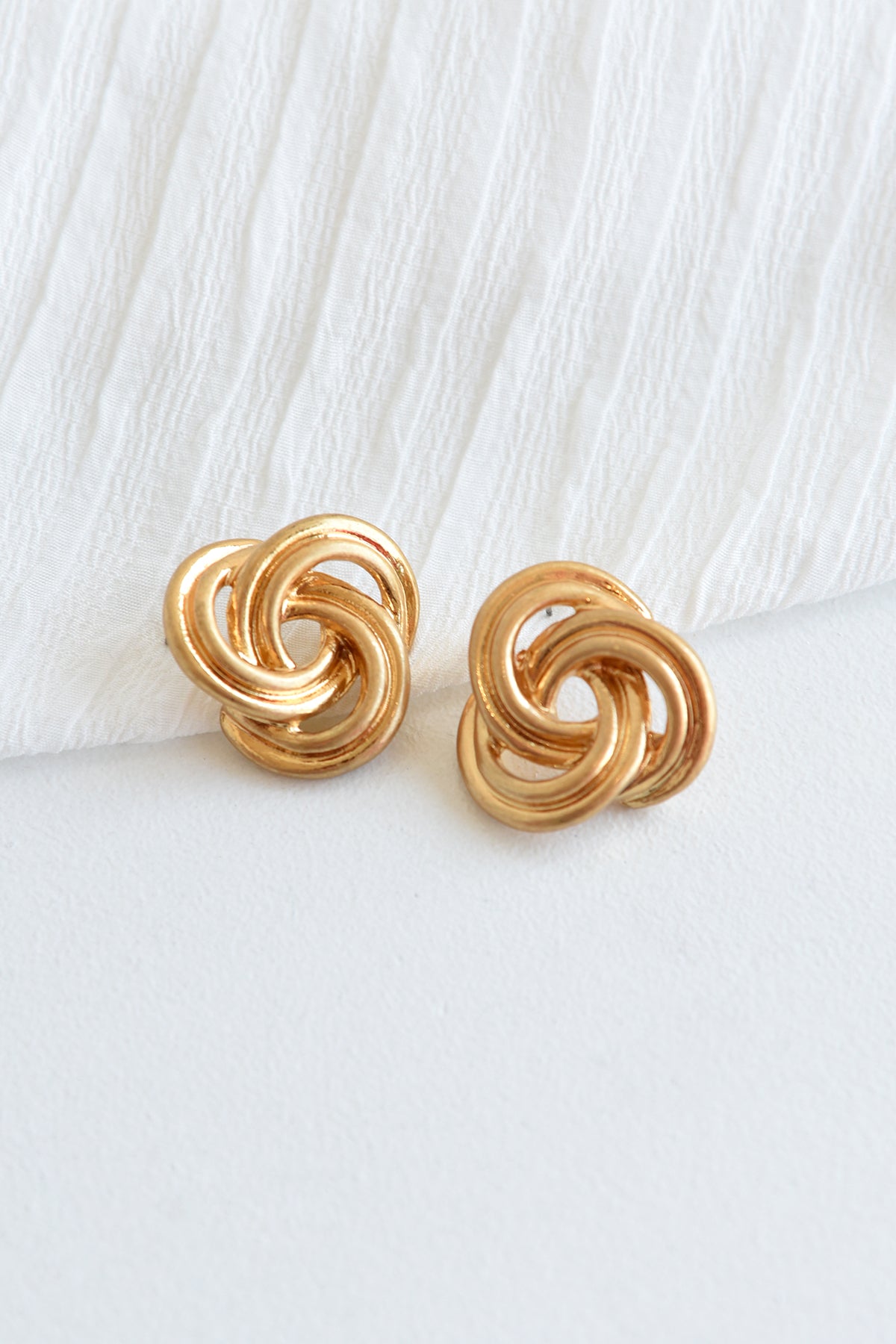 STATEMENT GOLD KNOT STUD EARRINGS