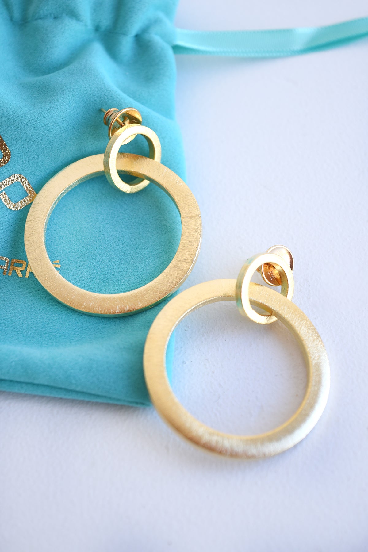 BETTY CARRE GOLD LINK FLAT HOOPS