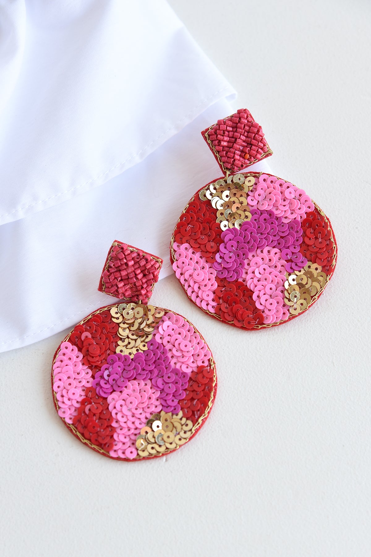 PINK AND RED BEADED DISK EARRINGS